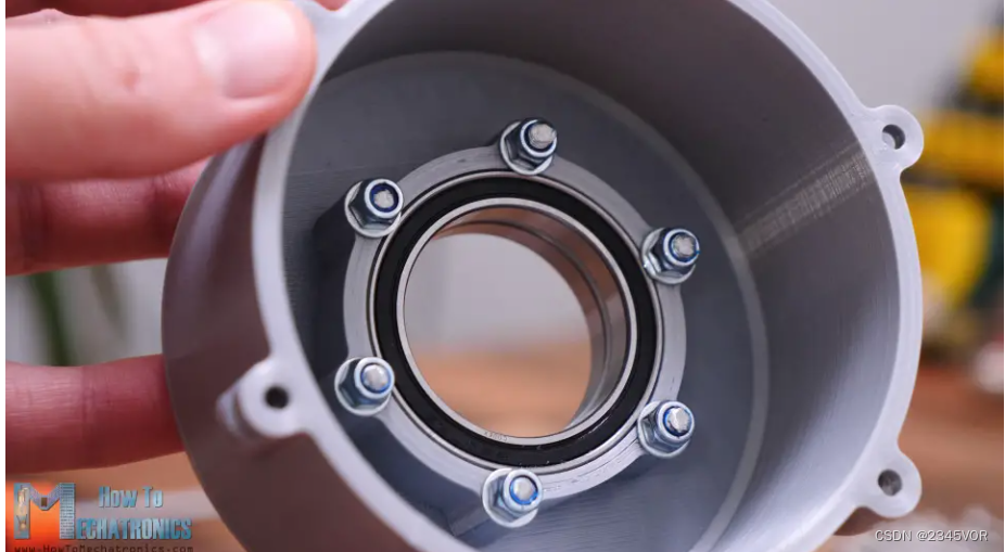 Securing the bearings to the Harmonic Drive housing