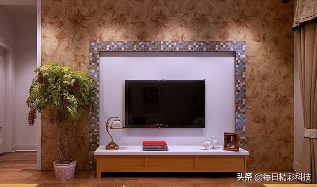 65寸的液晶电视是挂在墙上好还是放在电视柜上好?