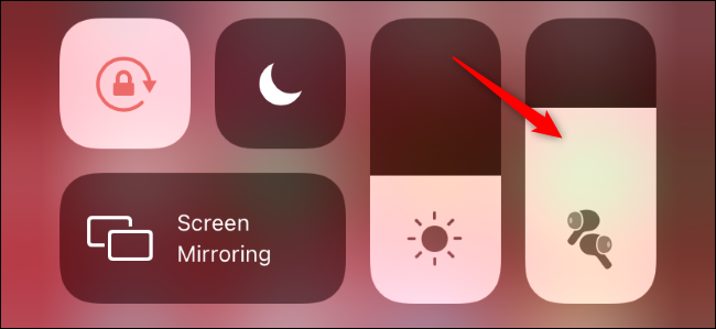 Accessing AirPods options in the IPhone Control Center.