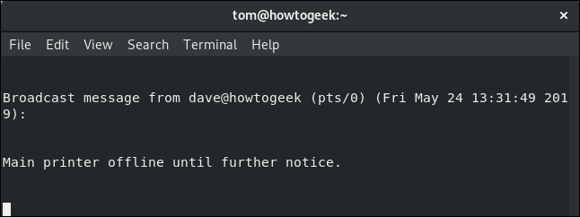 wall message to local user tom in a terminal window