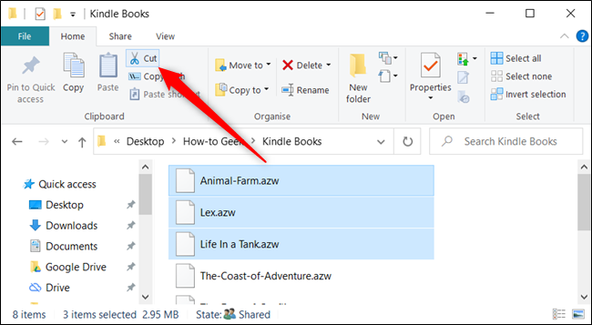 Select the files and click "Cut" from the Home tab.