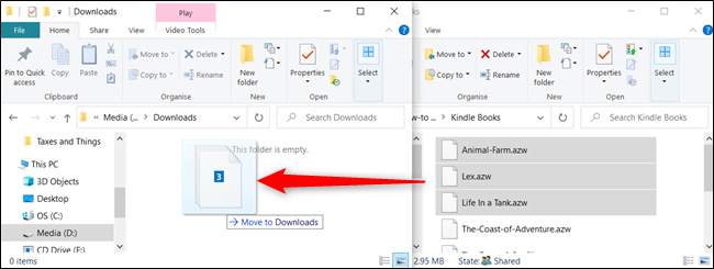 To move files to a a folder on a different drive, click and drag them, but before you drop, press Shift.