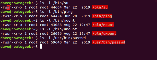 A list of Linux commands that have their SUID bit set in a terminal window.