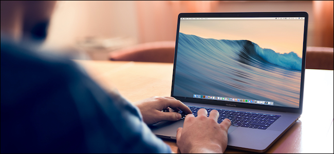 MacBook user using shortcut to show the desktop on Mac