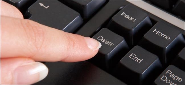 finger-pressing-delete-button