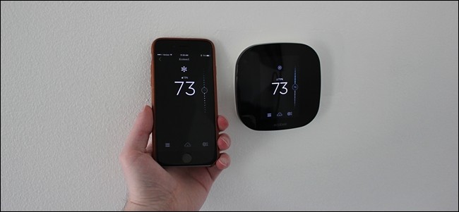 Smartphone controlling temperature on a smart thermostat