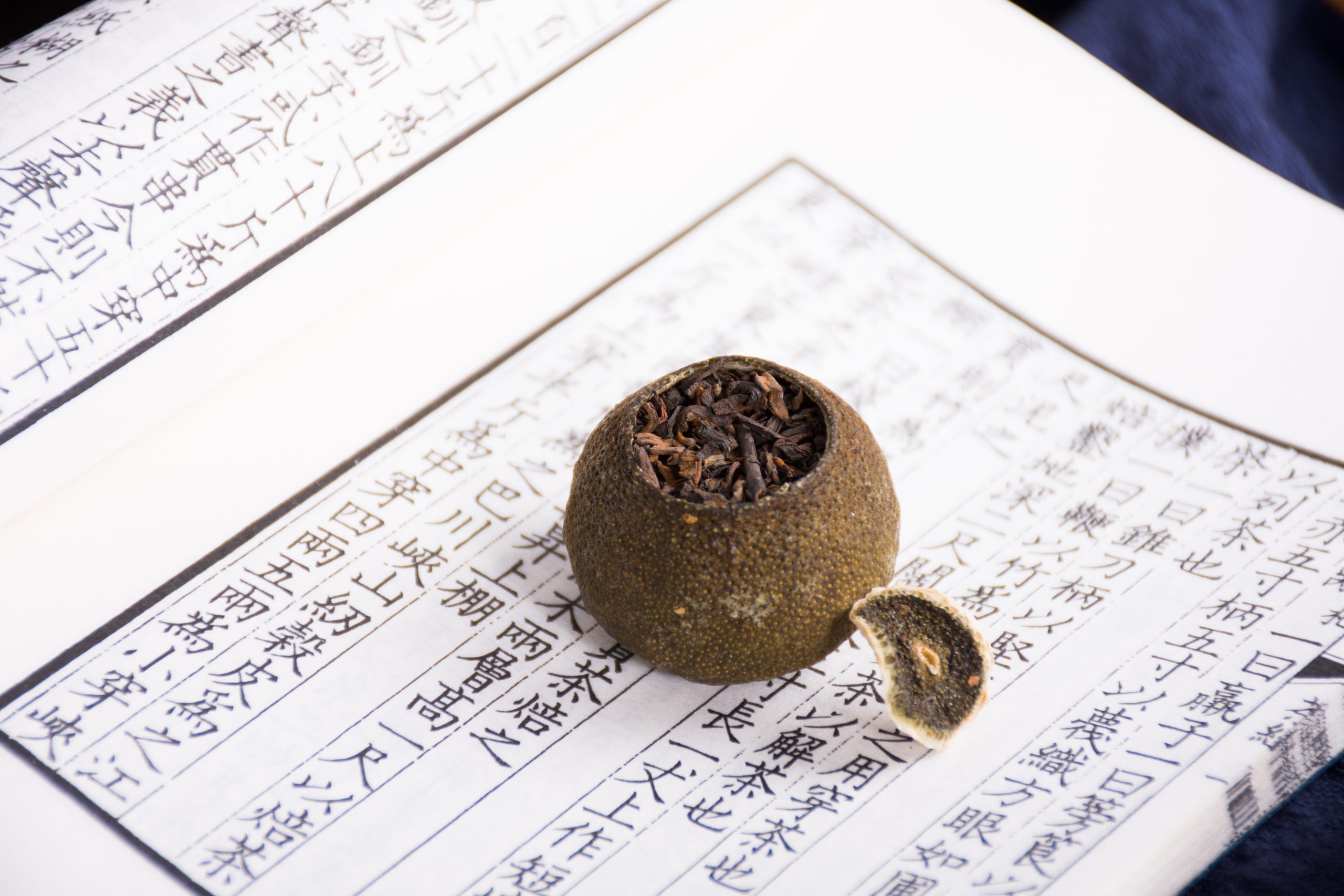 pu'er tea on a book