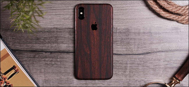 A dbrand phone case on an iPhone XS Max.