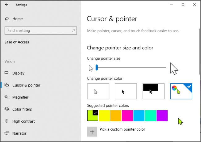 Custom mouse pointer color selection in Windows 10's Settings app with the green cursor selected.