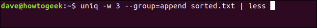 The "uniq -w 3 --group=append sorted.txt | less" command in a terminal window.