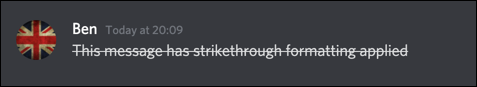 A Discord message with strikethrough formatting