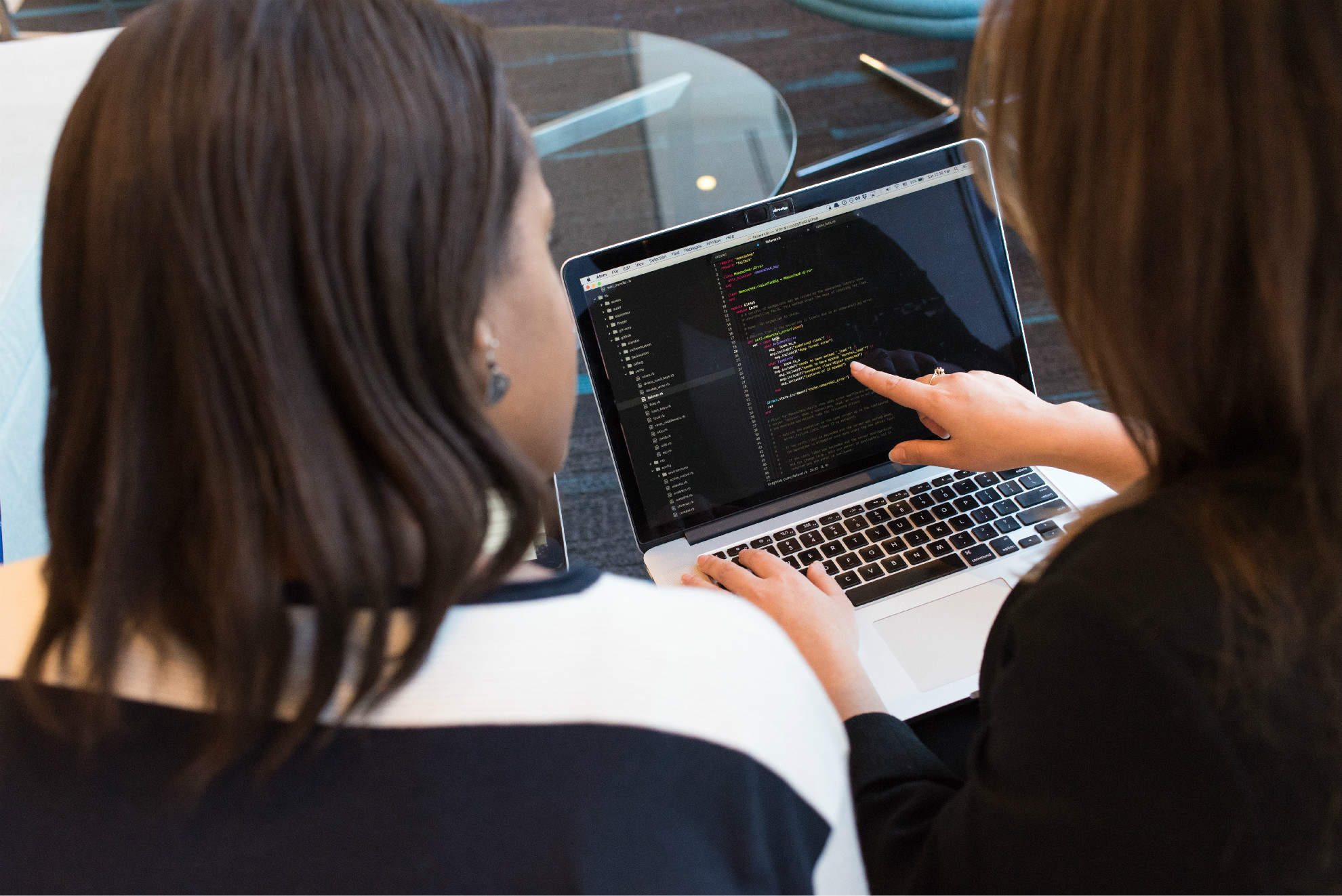 two-women-looking-at-the-code-at-laptop-1181263.jpg