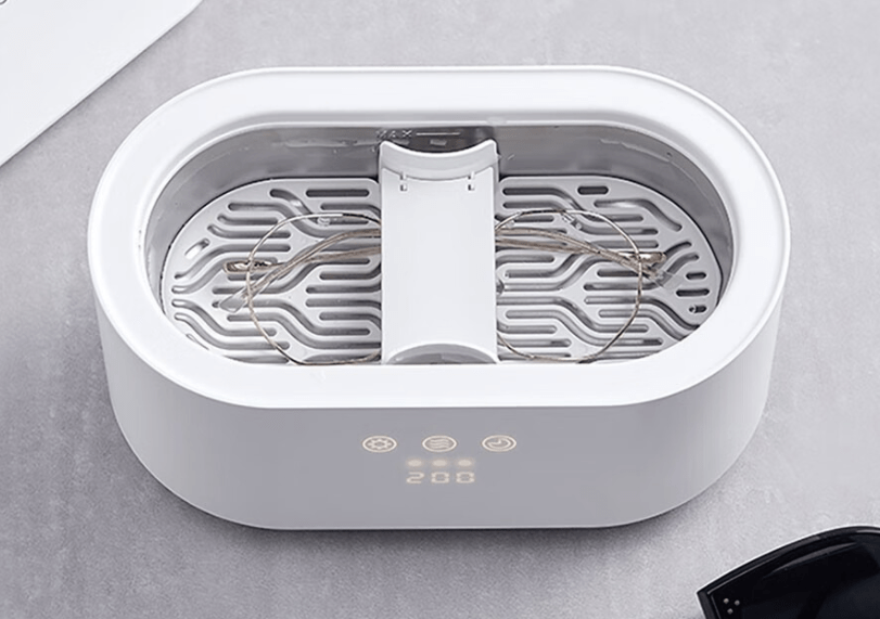 如何正确使用眼镜清洗机 c98eee2ea2ba45892bdc0b34b78fe577.png