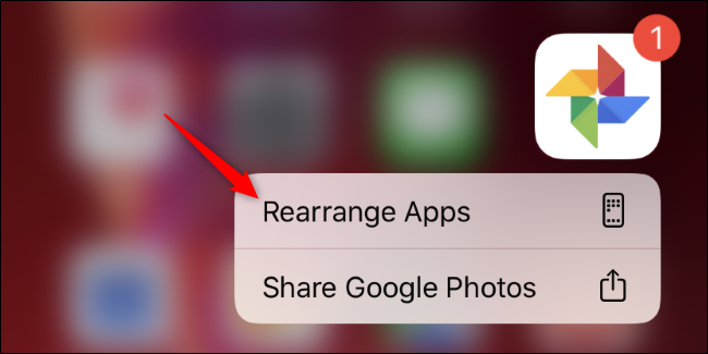Rearranging apps on an iPhone's home screen.