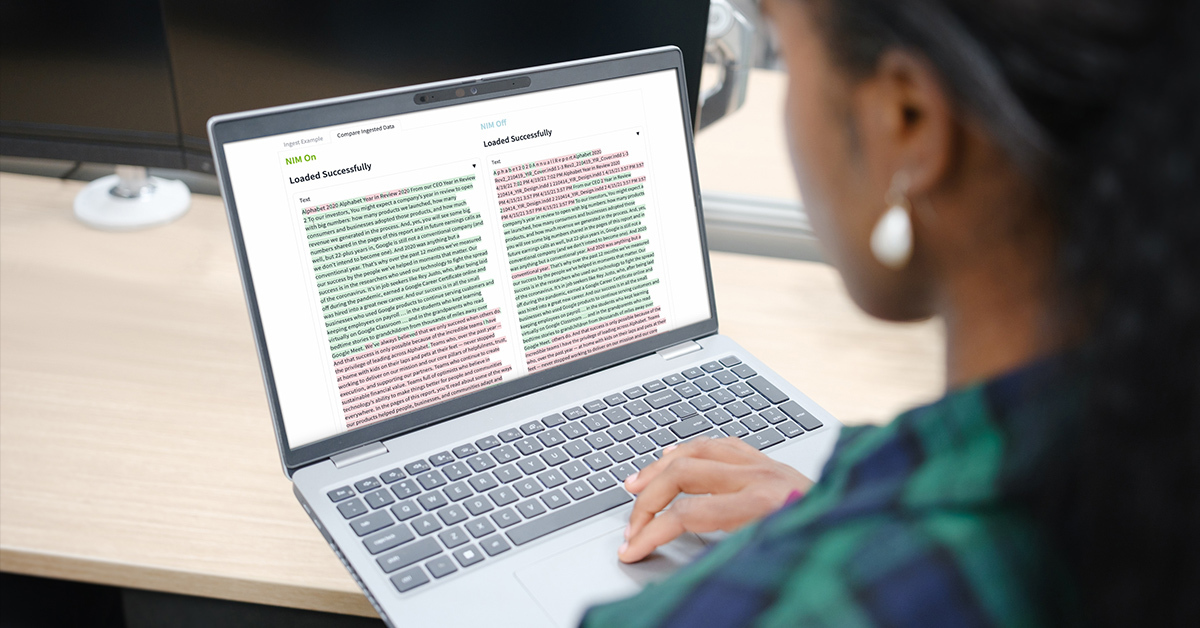 Photo of a student looking at a laptop, which has the PDF Retrieval NIM Agent Blueprint on the screen, with the message, "Loaded Successfully.".