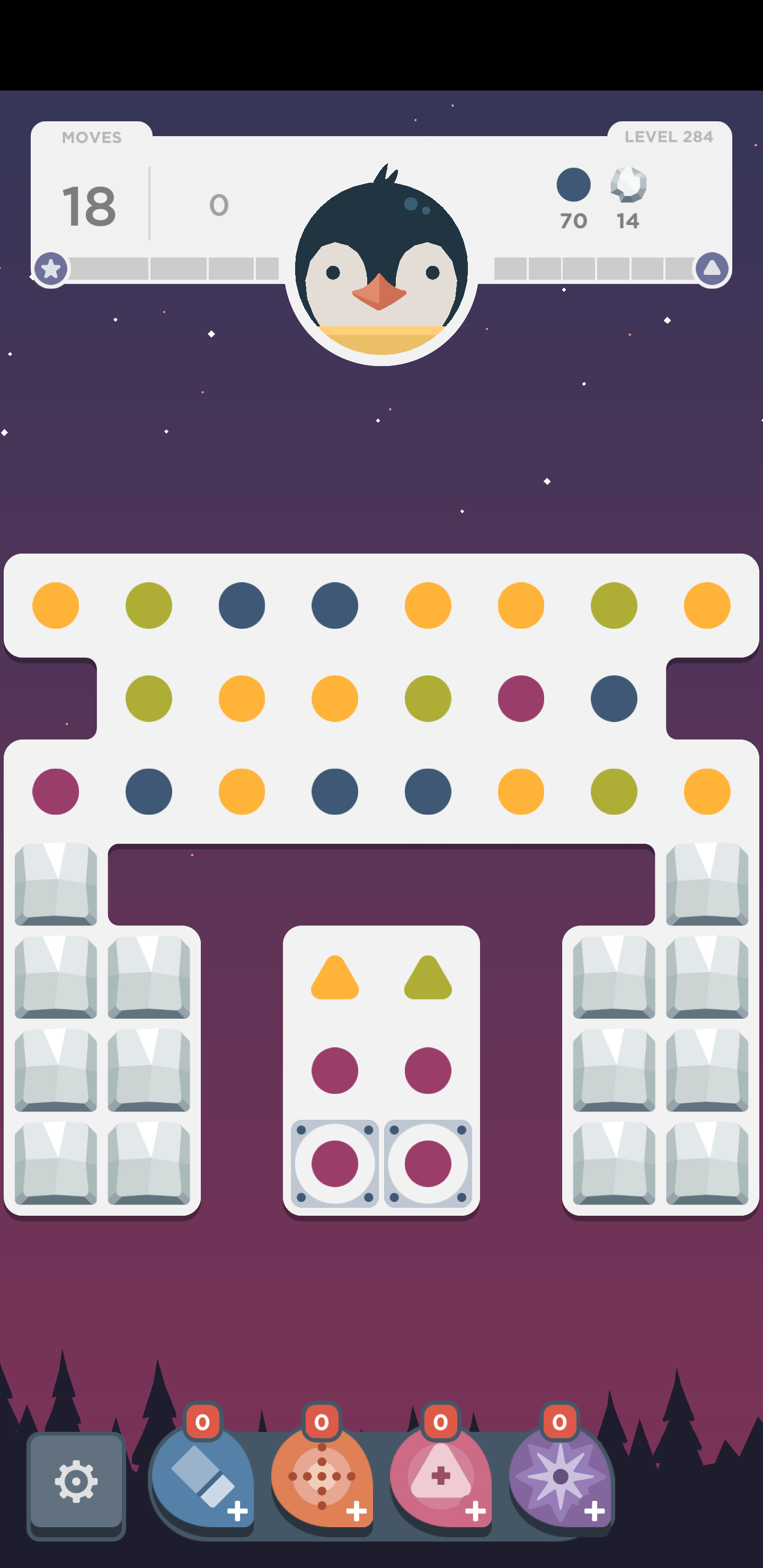 An example of a mobile phone game that has multiple colored dots you have to match, ice blocks, and a penguin character.